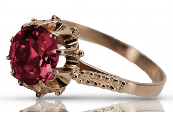 Vintage 14K Rose Gold Ring Adorned with Elegant Rubies. vrc045