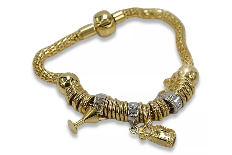 Pulsera italiana con dijes de oro amarillo de 14k cb110y